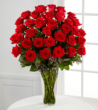 Long stem red rose arrangement in vase